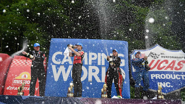NHRA winners at Bristol celebrate (from left): Justin Ashley (Top Fuel), Steve Johnson (Pro Stock Motorcycle), Erica Enders (Pro Stock) and Ron Capps (Funny Car). Photo courtesy NHRA.
